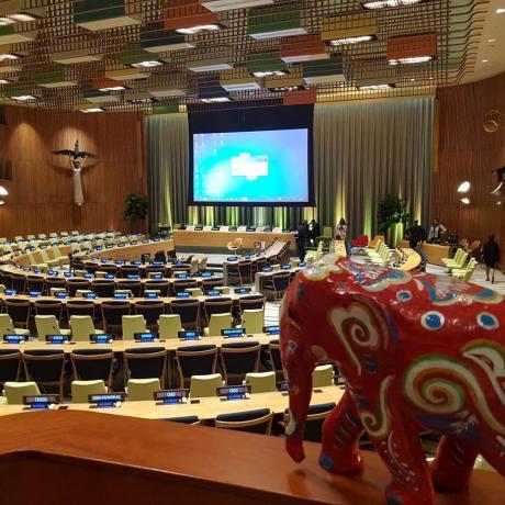 A model elephant in a large meeting hall