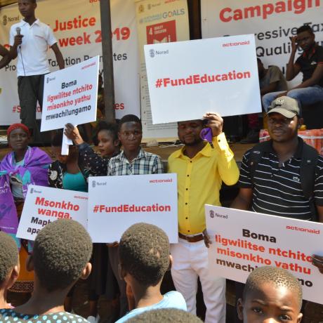 People protesting for education funding