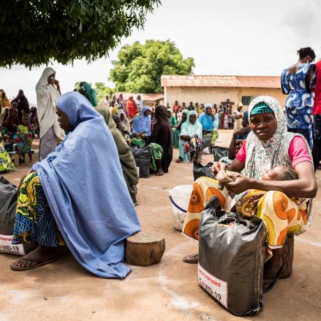 Some recipients of relief packages put together by ActionAid and distributed in Gwalada community.